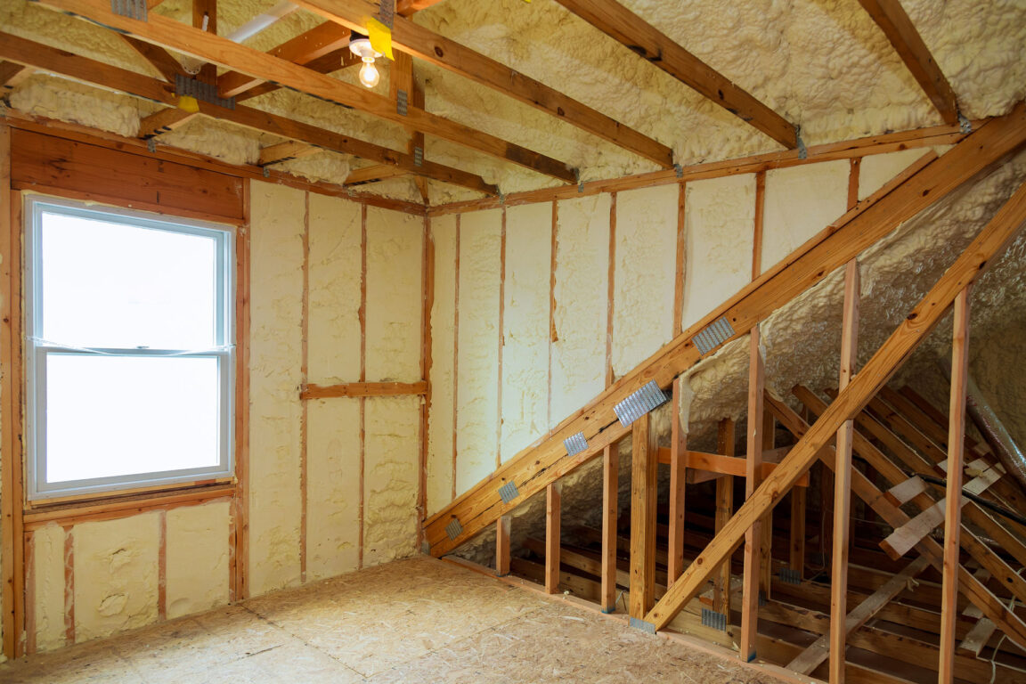 spray foam insulation within interior of home