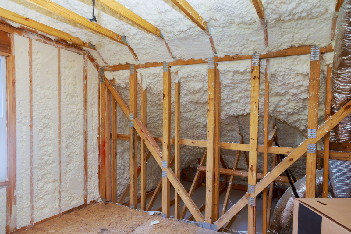 spray foam insulation in a newly constructed attic