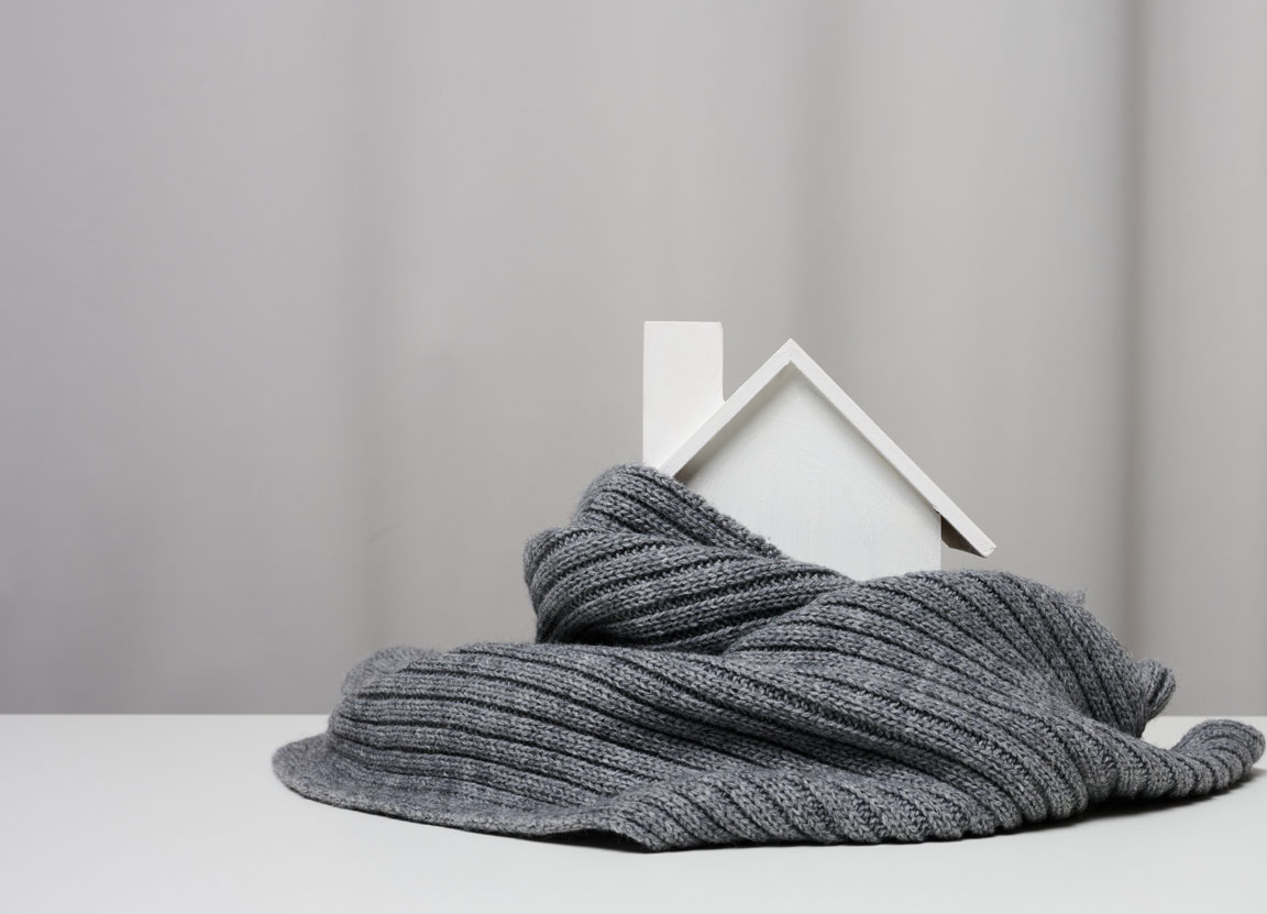 grey scarf wrapped around model home