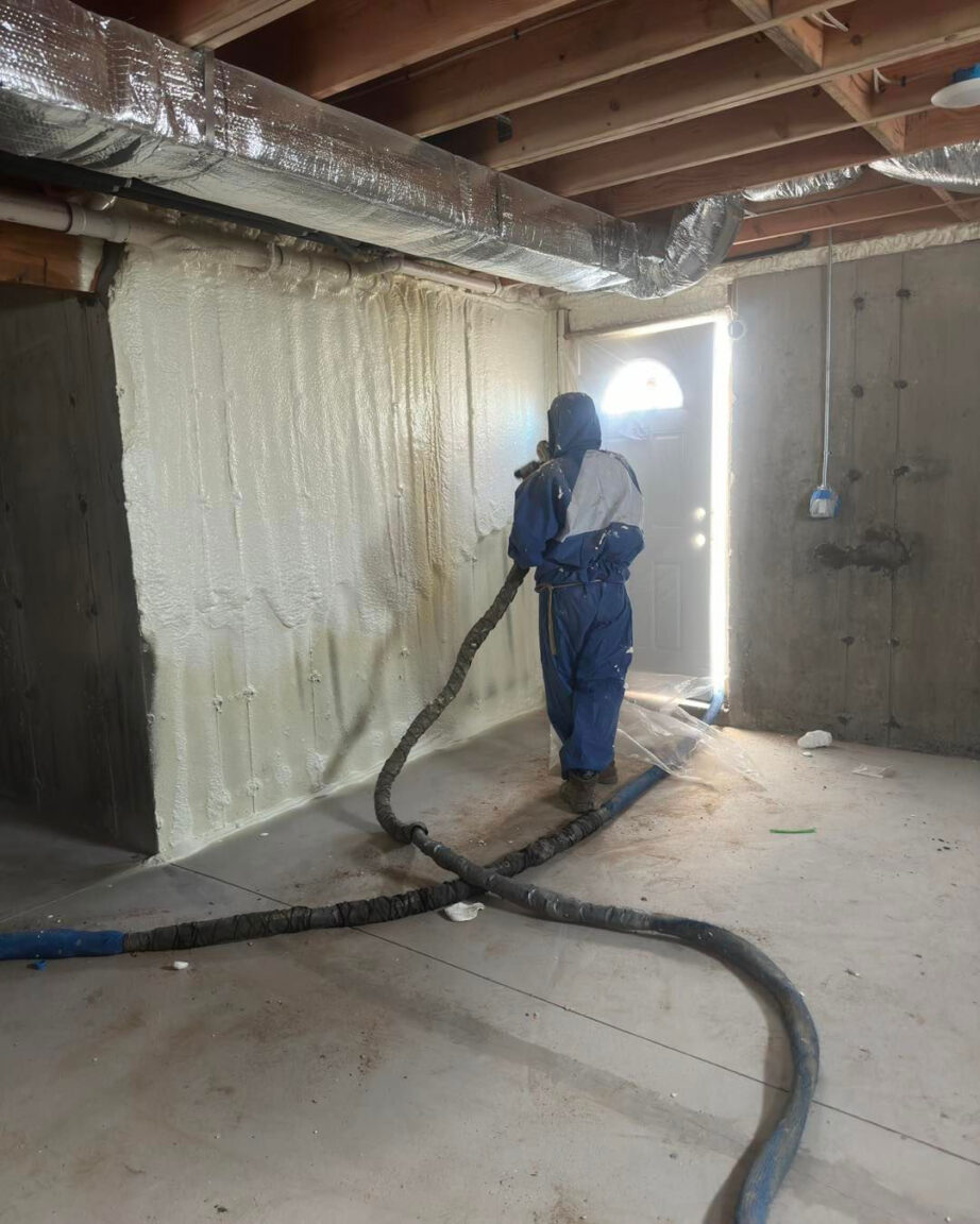 basement spray foam insulation being applied