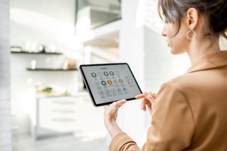 controlling-smart-home-with-a-digital-tablet-2025-03-13-08-15-48-utc Smart Home Device
